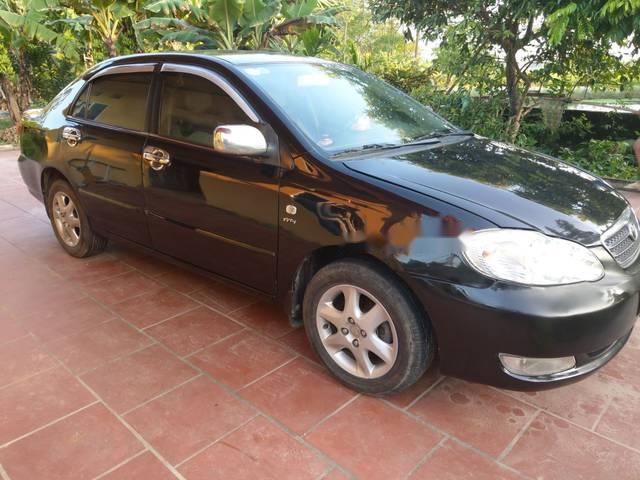 Bán Toyota Corolla Altis năm 2005, màu đen, 275 triệu