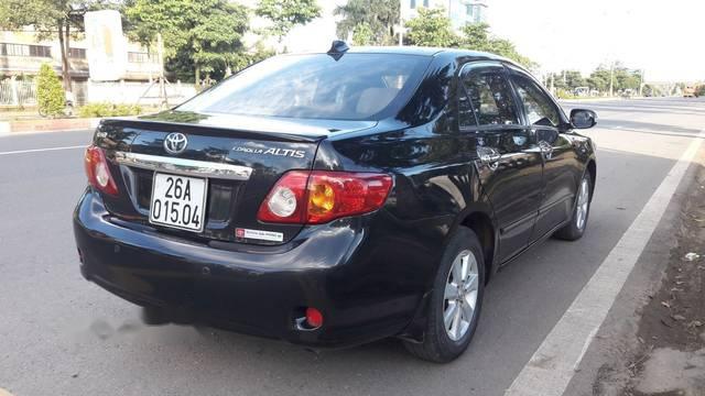 Cần bán xe Toyota Corolla altis sản xuất 2009, màu đen giá cạnh tranh0