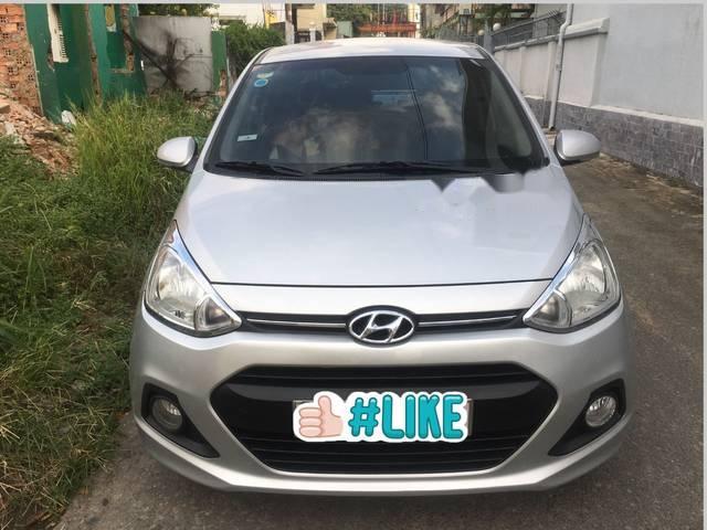 Cần bán gấp Hyundai Grand i10 1.25AT sản xuất 2014, màu bạc, xe nhập