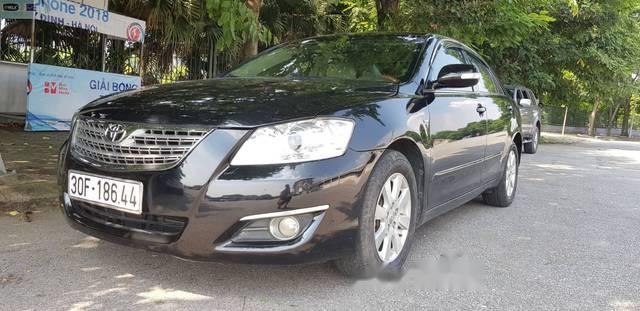 Cần bán Toyota Camry 2.4 G đời 2010, màu đen