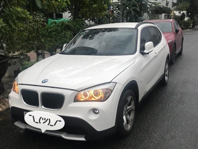 Cần bán BMW X1 2011, đăng ký 2013, odo 13000km, màu trắng, nhập khẩu Đức, xe nhà rất tốt