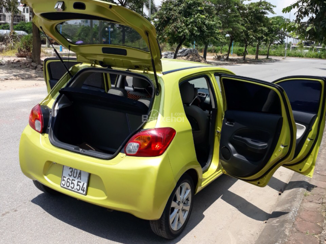 Bán nhanh Mitsubishi Mirage 1.2AT 2015 màu vàng chanh, nhập khẩu nguyên chiếc