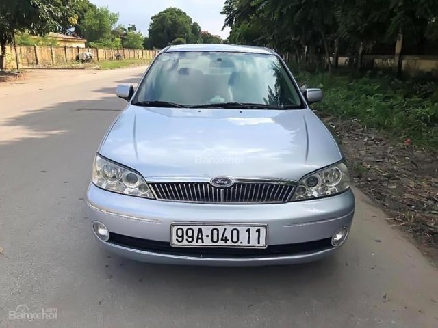 Bán ô tô Ford Laser GHIA 1.8 MT đời 2002, màu bạc chính chủ, giá 152tr