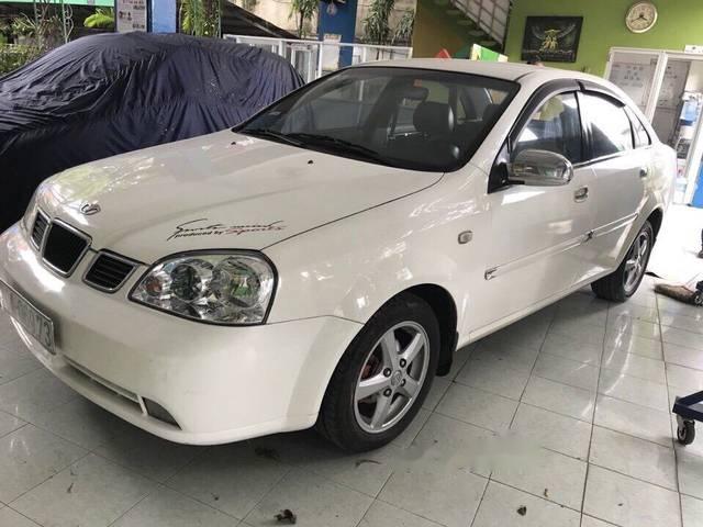 Bán Daewoo Lacetti MT đời 2004, màu trắng, máy 1.8 chạy ngon