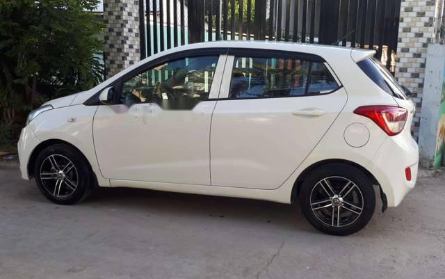 Cần bán lại xe Hyundai Grand i10 sản xuất 2014, màu trắng, biển số Bình Dương