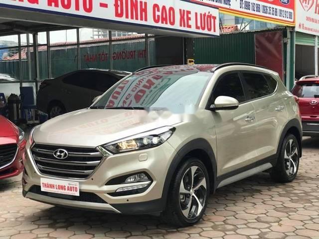 Bán Hyundai Tucson 1.6 Turbo năm sản xuất 2014, màu vàng be