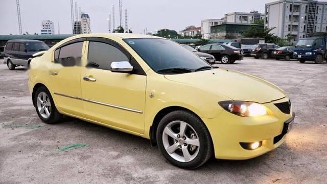 Bán Mazda 3 sản xuất năm 2004, màu vàng số tự động 