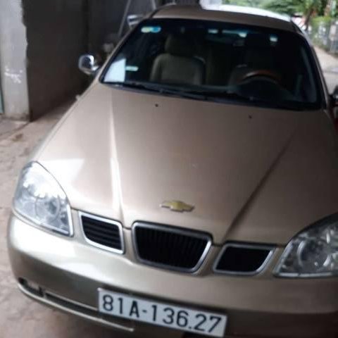 Bán xe Daewoo Lacetti năm sản xuất 2004, màu vàng, giá 155 triệu