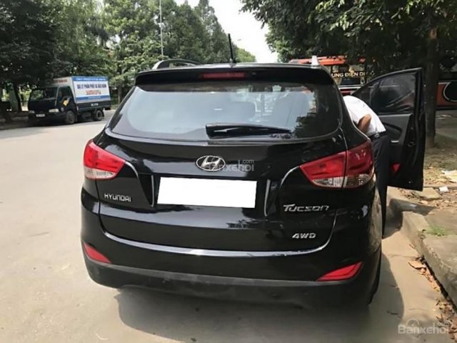 Cần bán xe Hyundai Tucson 2.0 AT 4WD sản xuất năm 2010, màu đen, nhập khẩu nguyên chiếc, 536 triệu