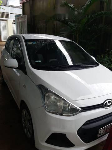 Bán ô tô Hyundai Grand i10 đời 2014, màu trắng xe gia đình giá cạnh tranh