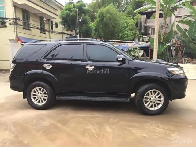 Gia đình bán xe Toyota Fortuner G 2013, màu đen 