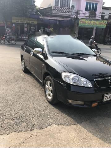 Tôi cần bán nhanh Toyota Corolla Altis đời 2003, nguyên bản