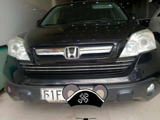 Cần bán xe Honda CR V đời 2009, màu đen, nội thất da màu đen