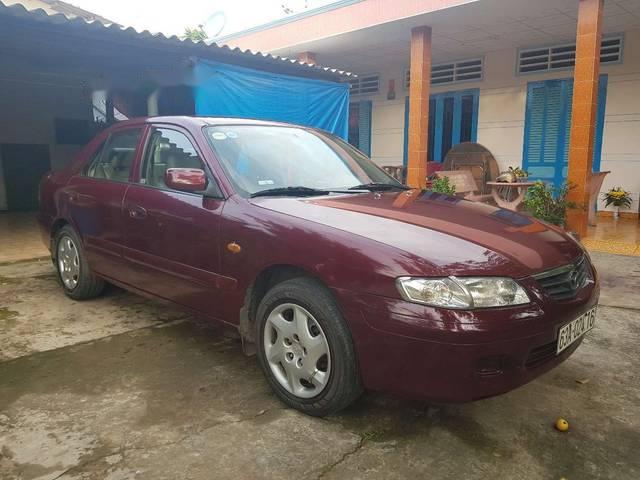 Cần bán gấp Mazda 626 năm sản xuất 2001, màu đỏ0