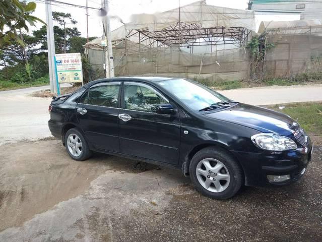 Cần bán lại xe Toyota Corolla altis đời 2005, màu đen, 313tr