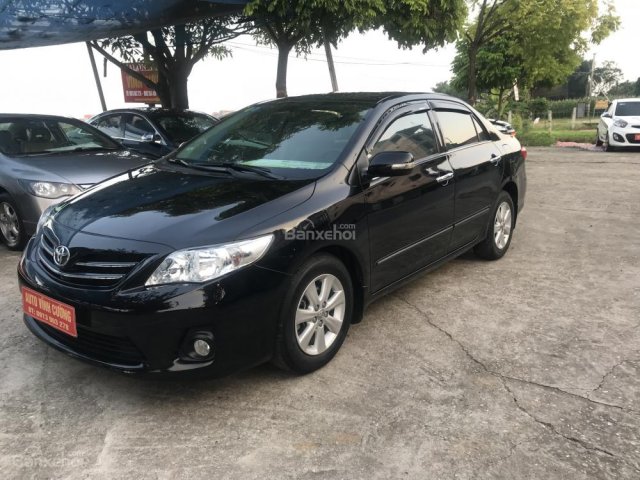 Bán ô tô Toyota Corolla Altis 1.8G MT năm 2013, màu đen