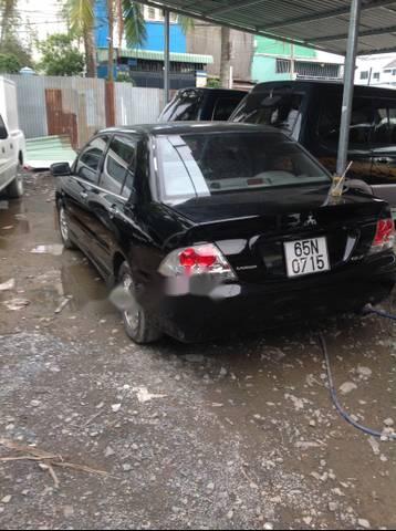 Cần bán lại xe Mitsubishi Lancer 2003, màu đen