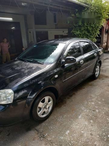 Cần bán Chevrolet Lacetti SE đời 2004, màu đen, giá 115tr