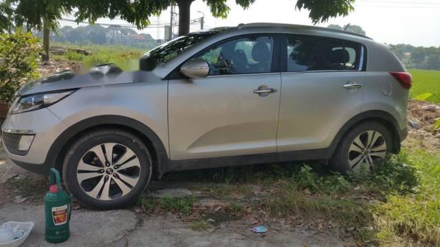 Cần bán xe Kia Sportage đời 2011, số tự động, màu bạc, xe chính chủ đi ít