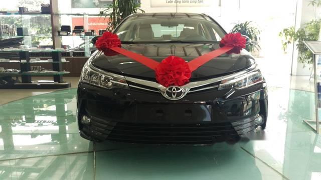 Cần bán xe Toyota Corolla Altis 1.8 E CVT năm 2018, màu đen, 707 triệu