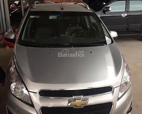 Bán xe Chevrolet Spark LTZ 2013 màu bạc, số tự động, biển Sài Gòn, đi 68000km