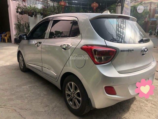 Nhà cần bán Grand i10, sx 2016, số sàn, màu bạc