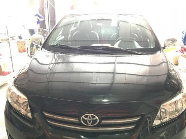 Cần bán lại xe Toyota Corolla altis 1.8G sản xuất 2010, màu đen xe gia đình