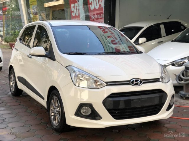 Cần bán xe Hyundai Grand i10 1.0AT đời 2015, màu trắng