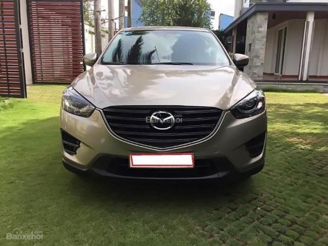 Cần bán Mazda CX 5 đời 2016, màu vàng