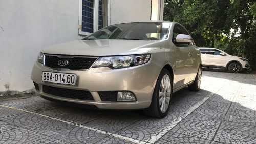 Chính chủ bán Kia Forte 1.6 MT 2011, màu vàng cát