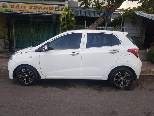 Bán Hyundai Grand i10 2014, màu trắng xe gia đình0