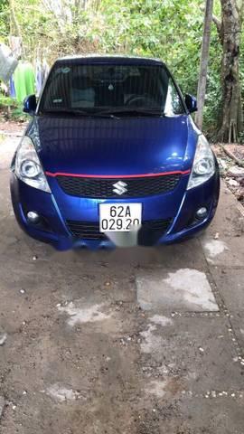 Bán gấp ô tô Suzuki Swift đời 2014, màu xanh lam