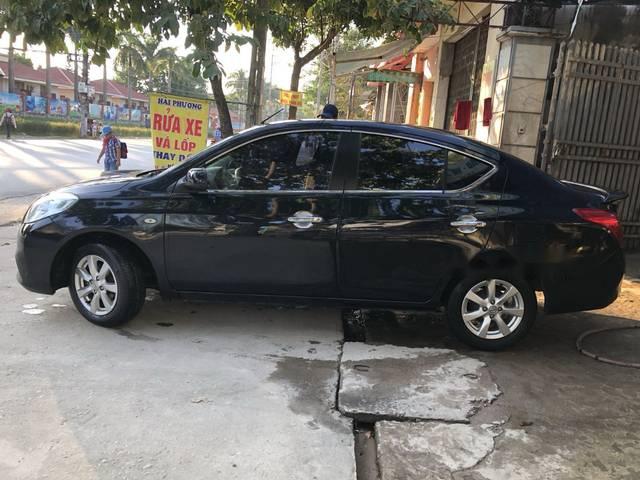 Cần bán xe Nissan Sunny sản xuất năm 2013, màu đen0