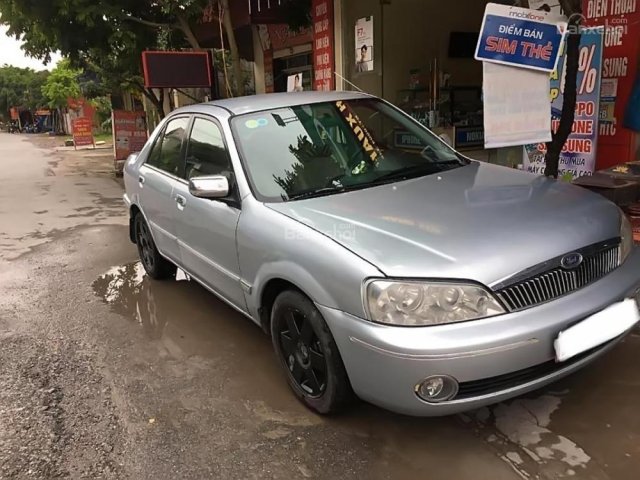 Bán Ford Laser Delu 1.6 MT đời 2002, màu bạc