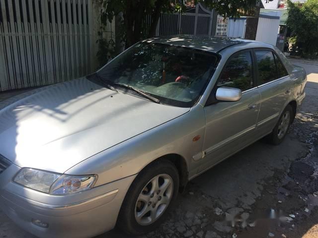 Gia đình bán xe Mazda 626 sản xuất 2002, màu bạc  0