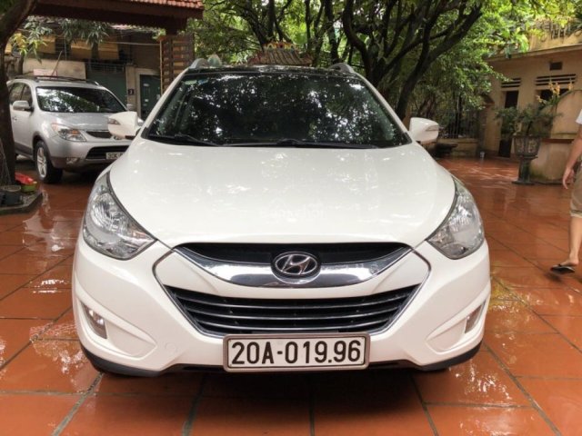 Cần bán Hyundai Tucson sản xuất 2011, màu trắng, xe nhập