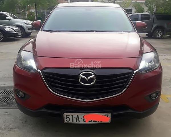 Bán xe Mazda CX9 màu đỏ đô, đời 2014, máy 3.7L, số tự động đi được 70.000km