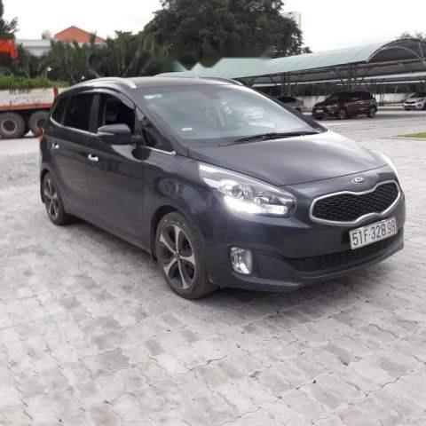 Bán Kia Rondo GAT sản xuất 2015, màu đen xe gia đình, 559 triệu