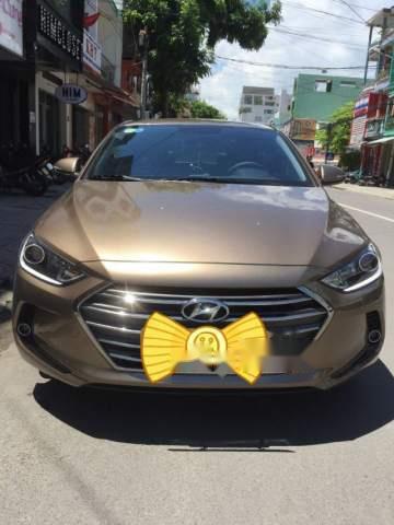 Bán xe Hyundai Elantra 1.6 MT năm sản xuất 2016, màu vàng 