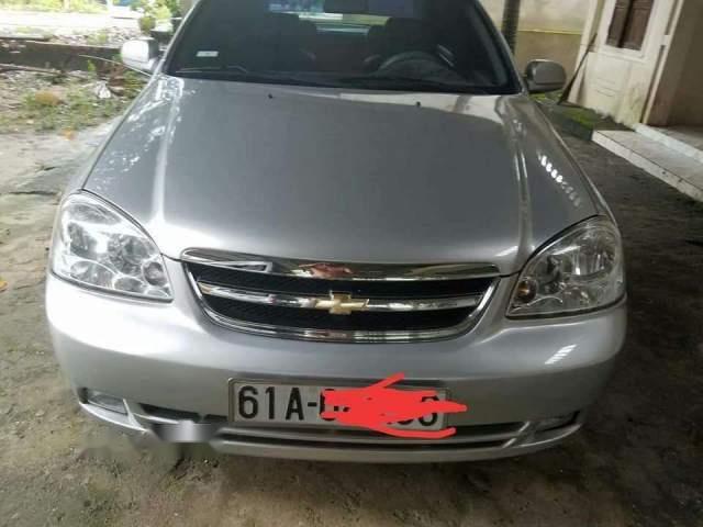 Bán xe Chevrolet Lacetti 1.6 MT đời 2012, màu bạc