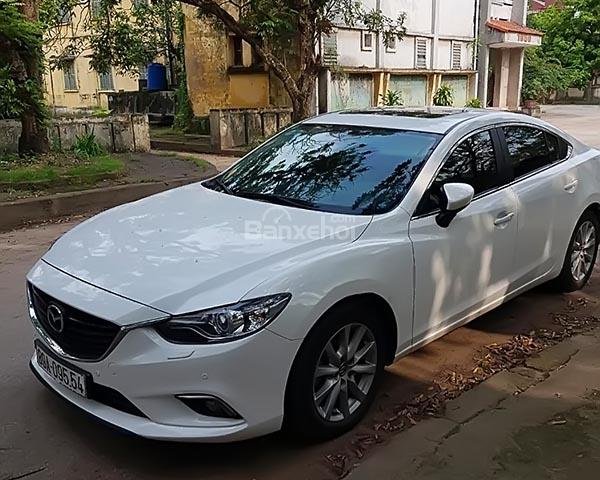 Bán Mazda 6 năm sản xuất 2016, màu trắng, 750tr