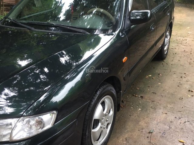 Cần bán gấp Mazda 626 2002, màu đen xe gia đình, 158tr