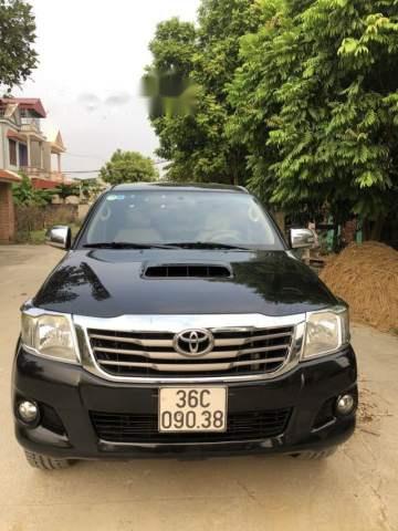 Bán Toyota Hilux 2.5E đời 2014, màu đen, 495tr0