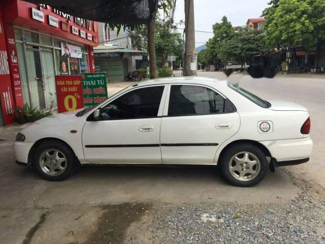 Bán xe Mazda 323 đời 2000, màu trắng