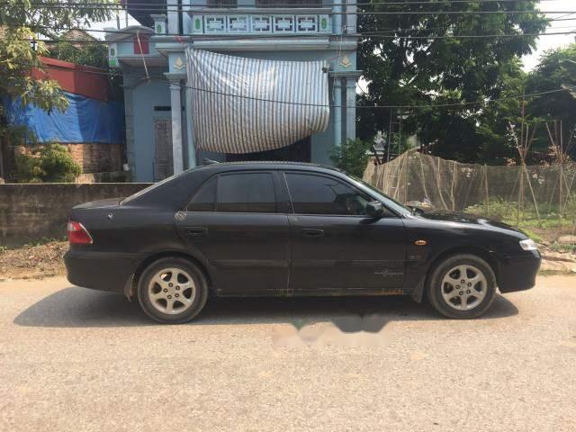 Bán Mazda 626 2003, màu đen, giá 168tr0