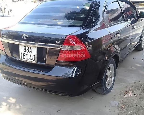 Gia đình bán xe Daewoo Gentra đời 2011, màu đen