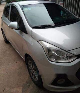 Cần bán xe Hyundai Grand i10 sản xuất 2014, màu bạc còn mới