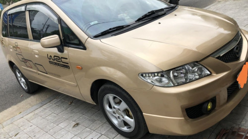 Bán Mazda Premacy 1.8 AT đời 2004, màu vàng cát