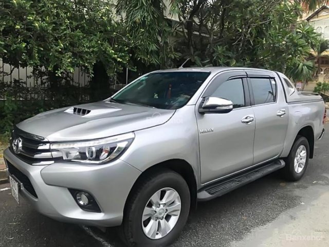 Cần bán xe Toyota Hilux 3.0G 4x4 AT đời 2015, màu bạc, xe nhập, 660tr