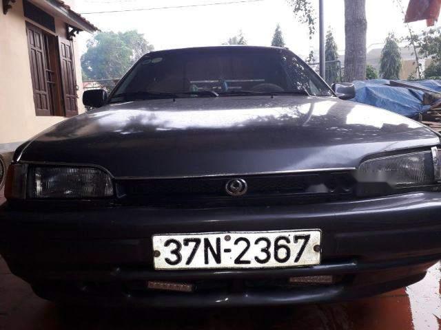 Xe Mazda 323 năm 1994, màu xám cần bán